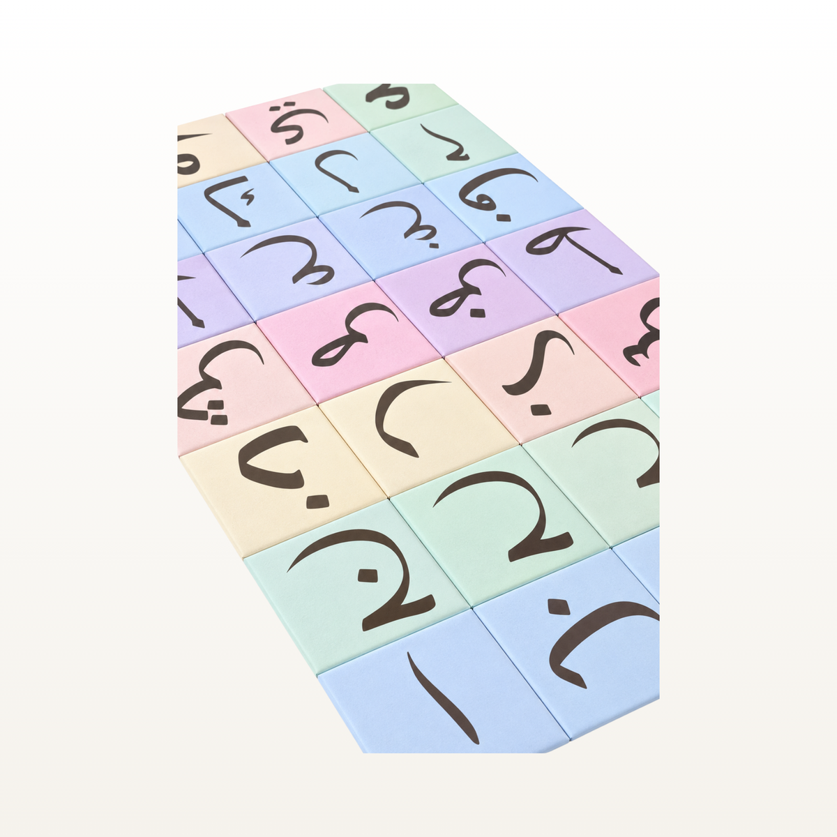 A set of pastel-colored Arabic numeracy tiles arranged in a 3D block structure, featuring black Arabic numerals on a clean white background.